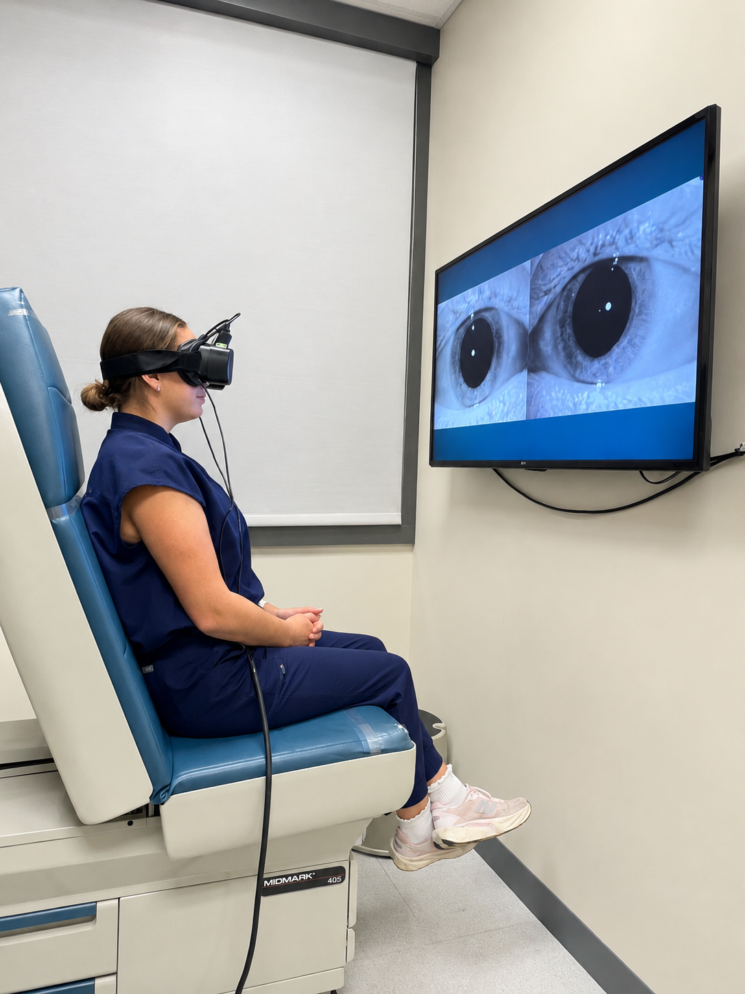 Patient wearing video goggles during a balance and vestibular exam